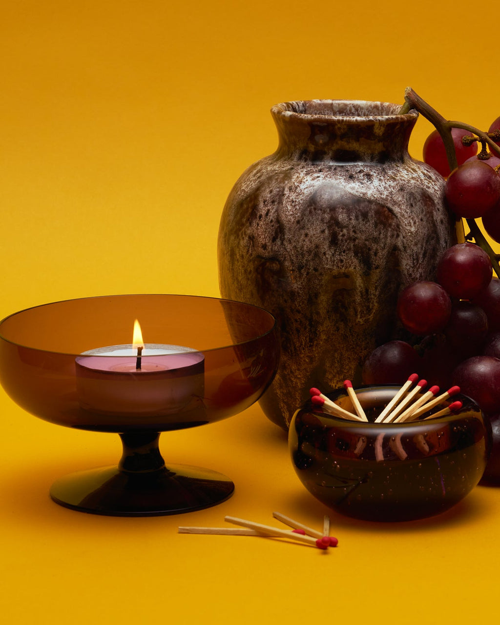 The Bullicante Amber Glass Tealight Holder