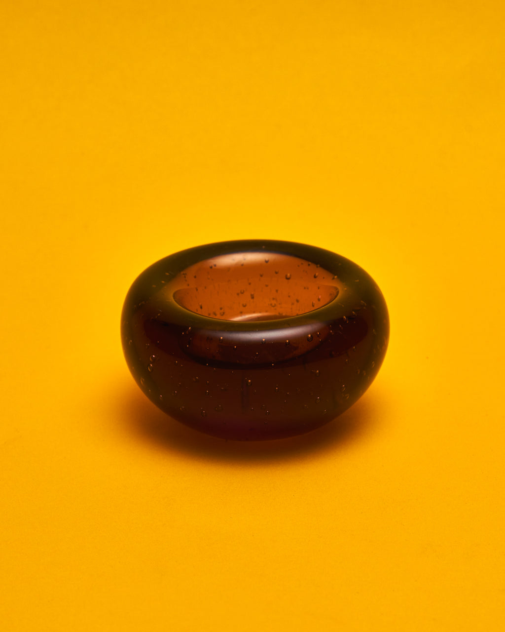 The Bullicante Amber Glass Tealight Holder