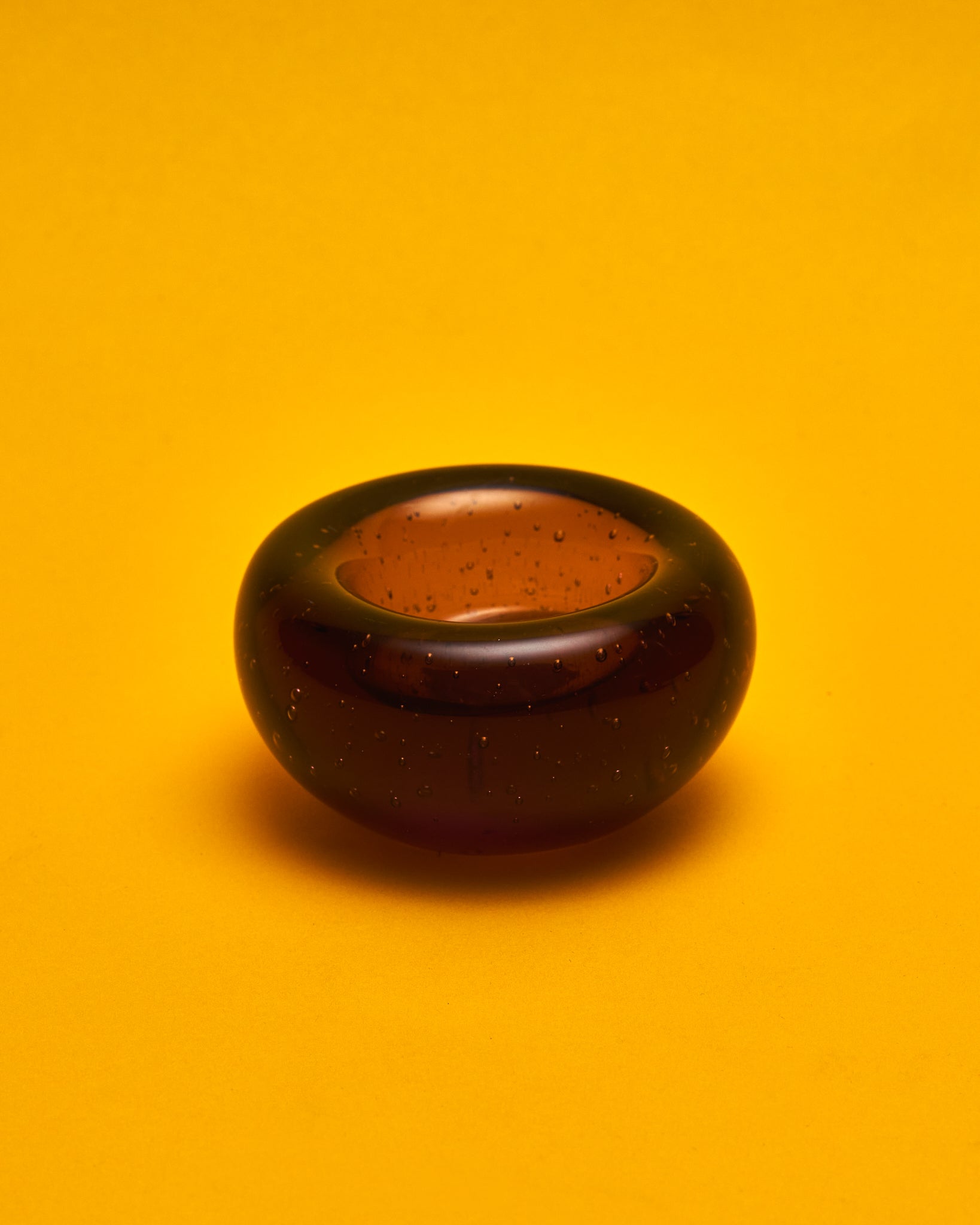 The Bullicante Amber Glass Tealight Holder